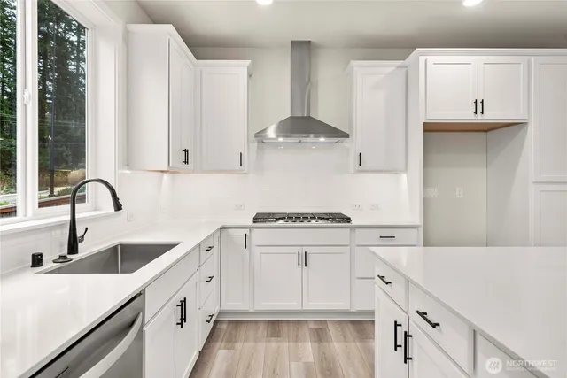 a view of cabinets with sink