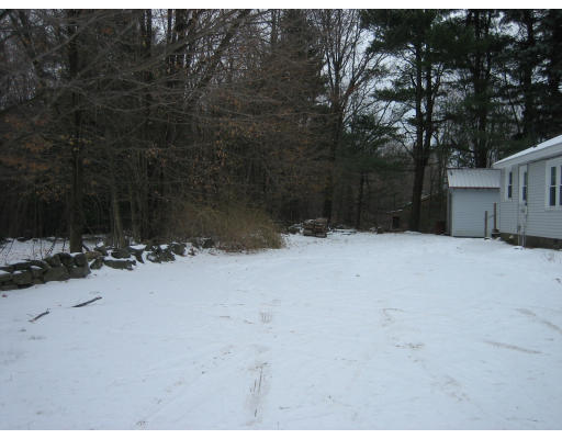147 Pond Brook Road Huntington, MA 01050 - Photo 4 of 14 a view of a covered with snow in the background