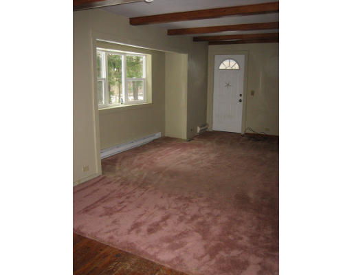 147 Pond Brook Road Huntington, MA 01050 - Photo 7 of 14 a view of an empty room with closet and a window