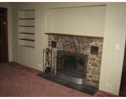 147 Pond Brook Road Huntington, MA 01050 - Photo 8 of 14 a view of a fireplace in the room