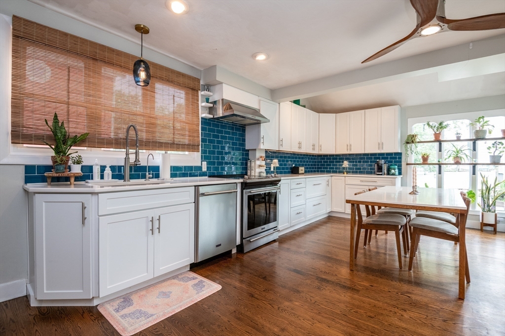 35 Central Street Middleton, MA 01949 - Photo 13 of 42 a kitchen with a sink cabinets and wooden floor