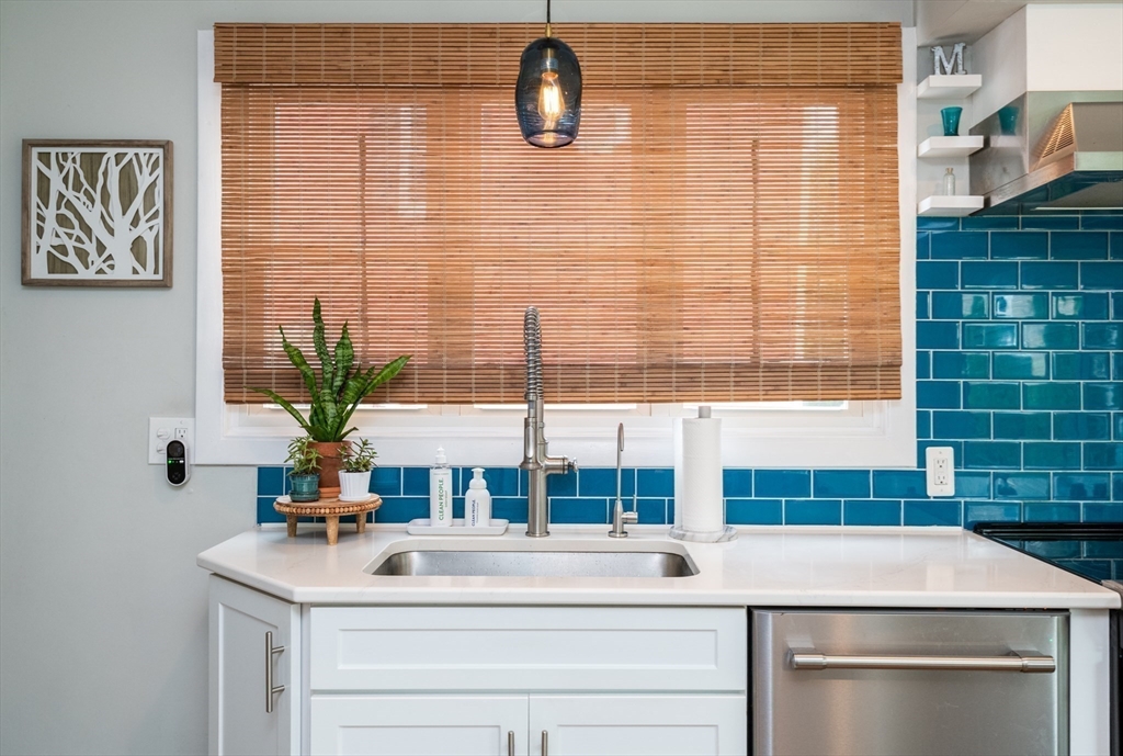 35 Central Street Middleton, MA 01949 - Photo 14 of 42 a bathroom with a sink and a mirror