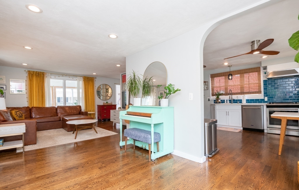 35 Central Street Middleton, MA 01949 - Photo 20 of 42 a living room with furniture and a wooden floor