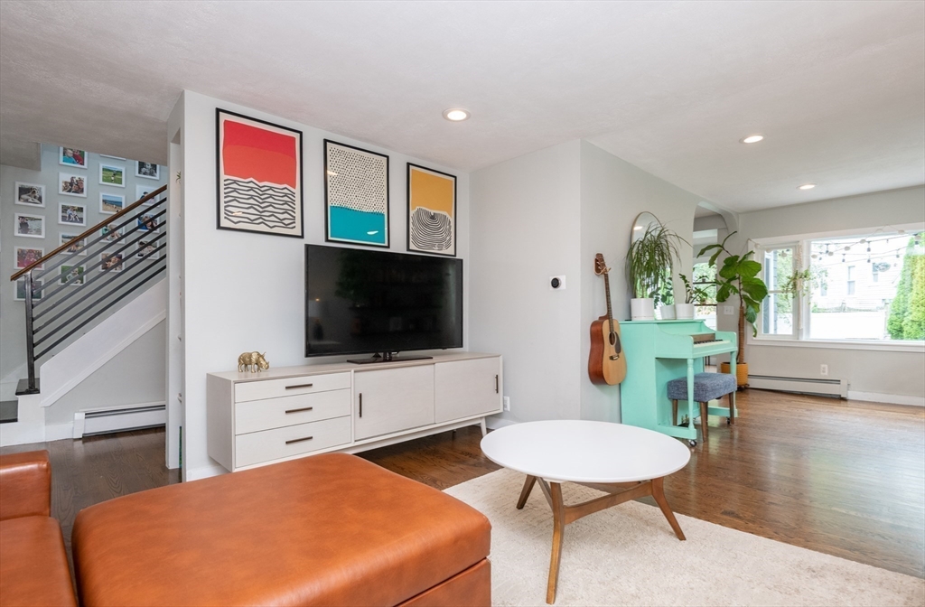 35 Central Street Middleton, MA 01949 - Photo 22 of 42 a living room with furniture and a flat screen tv