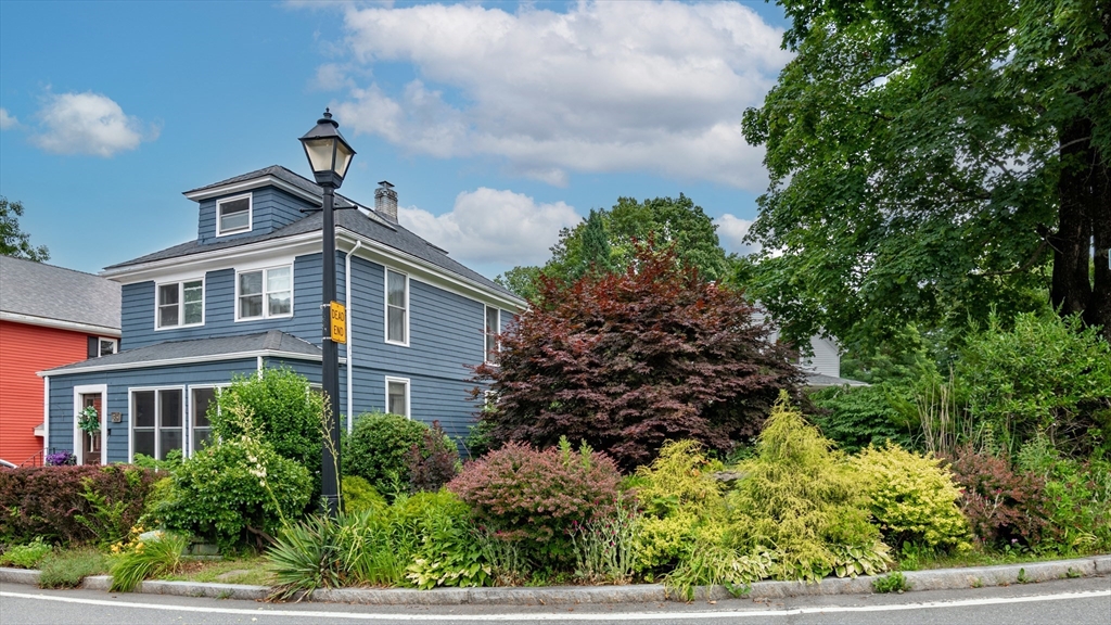 35 Central Street Middleton, MA 01949 - Photo 3 of 42 a front view of a house with a yard
