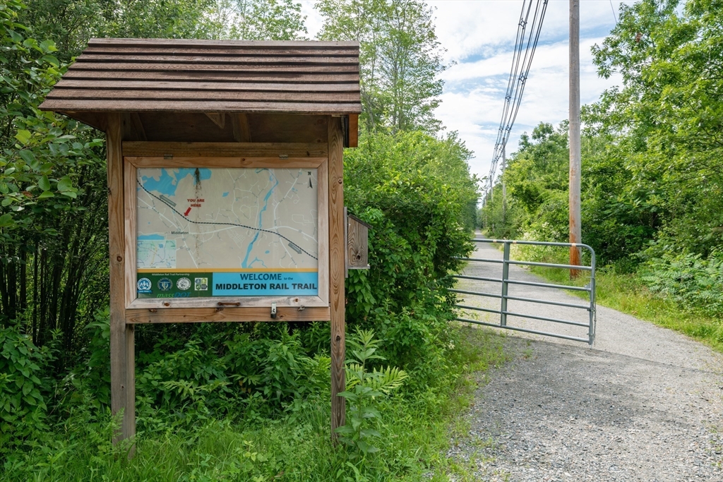 35 Central Street Middleton, MA 01949 - Photo 41 of 42 a backyard of a house with lots of green space