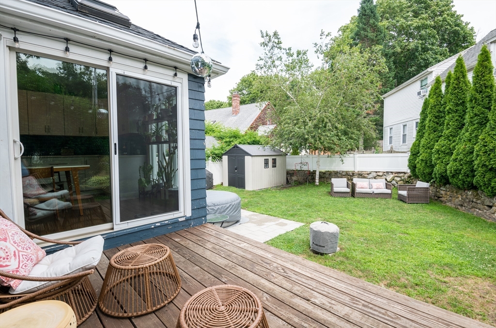 35 Central Street Middleton, MA 01949 - Photo 7 of 42 a view of a porch with furniture and garden