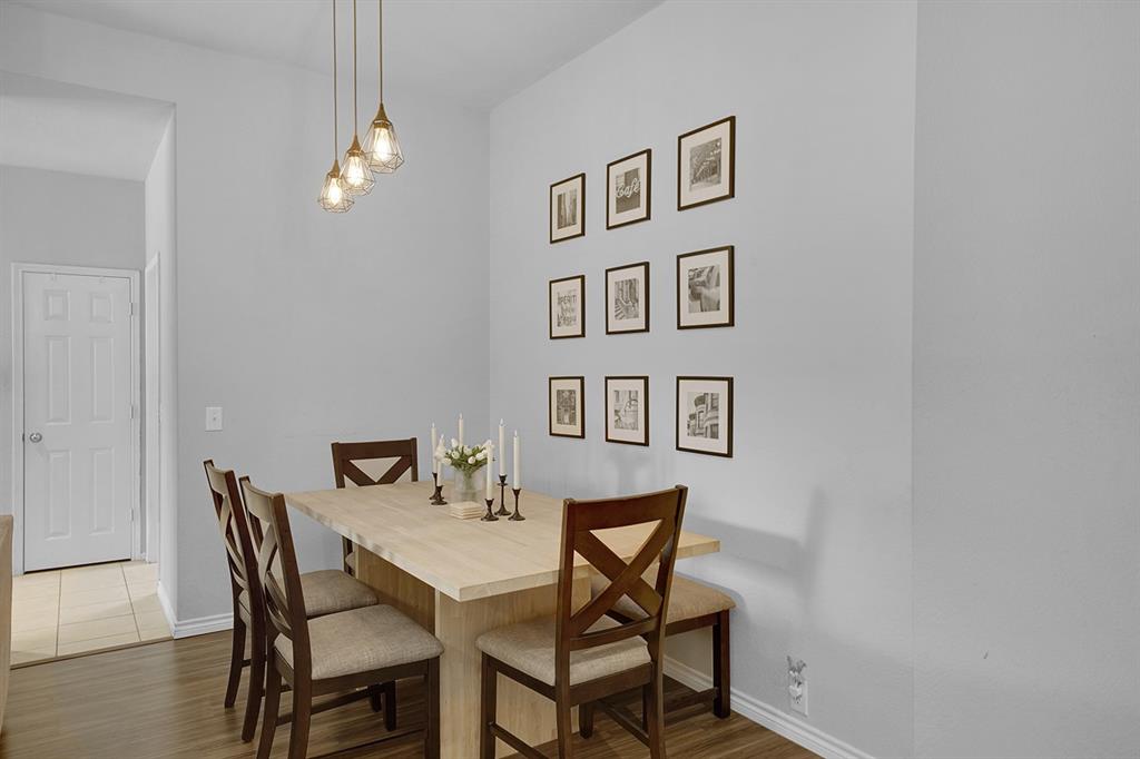 2609 Cowboy Trail Little Elm, TX 75068 - Photo 9 of 34 Dining room with dark wood-type flooring