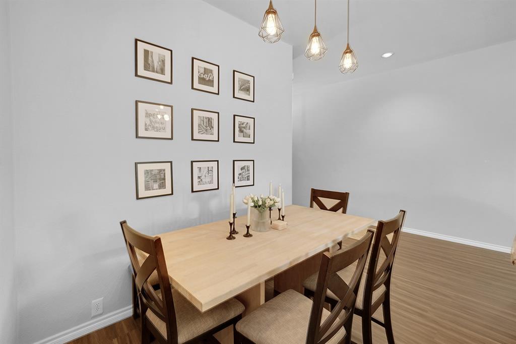 2609 Cowboy Trail Little Elm, TX 75068 - Photo 10 of 34 Dining area with wood finished floors and recessed lighting