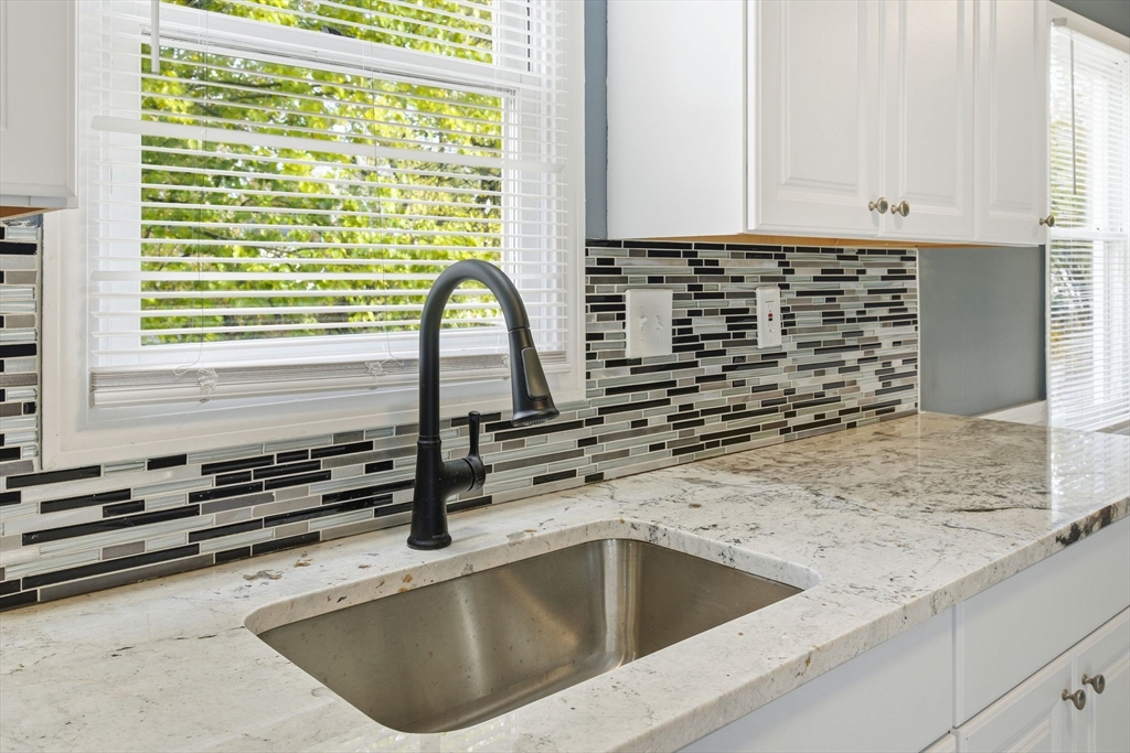 19 Emily Street Springfield, MA 01109 - Photo 13 of 41 a kitchen with a sink and a window