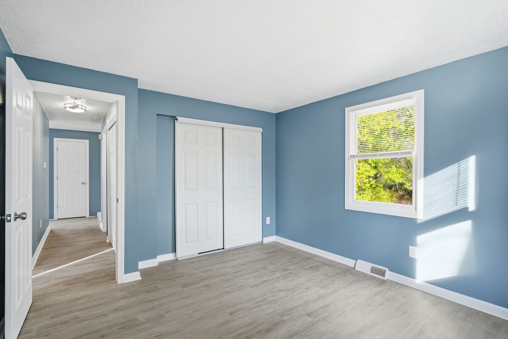 19 Emily Street Springfield, MA 01109 - Photo 22 of 41 a view of an empty room with window and closet area