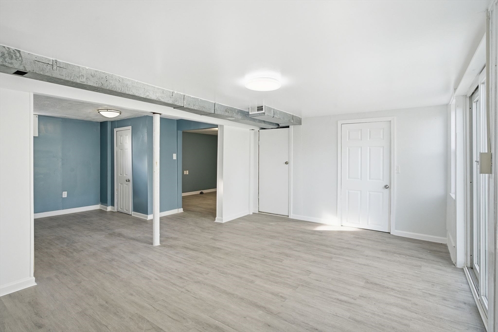 19 Emily Street Springfield, MA 01109 - Photo 36 of 41 a view of empty room with wooden floor