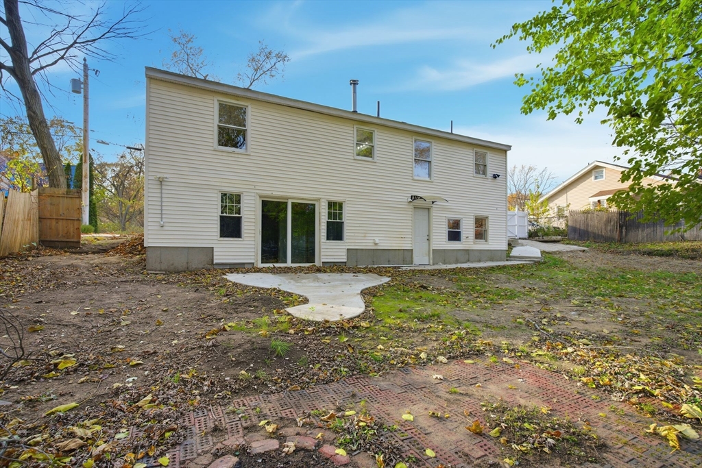 19 Emily Street Springfield, MA 01109 - Photo 41 of 41 a view of a house with backyard and a tree