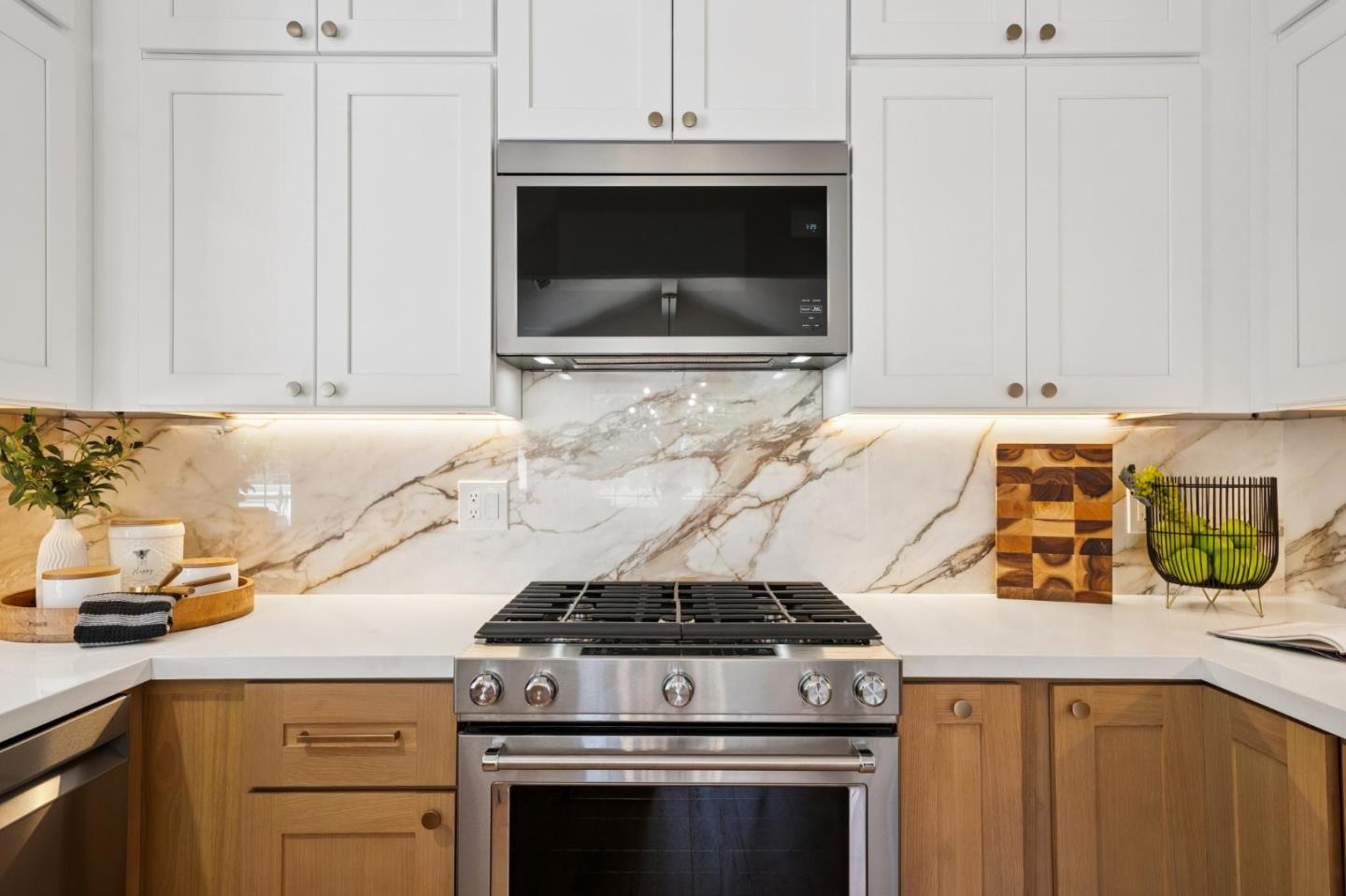 135 Troon Way Half Moon Bay, CA 94019 - Photo 15 of 44 a kitchen with a stove and a microwave