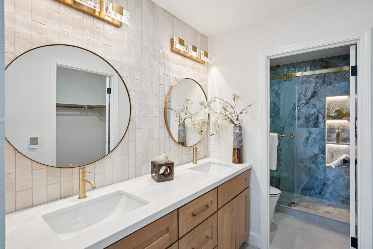 135 Troon Way Half Moon Bay, CA 94019 - Photo 22 of 44 a bathroom with a sink and a mirror