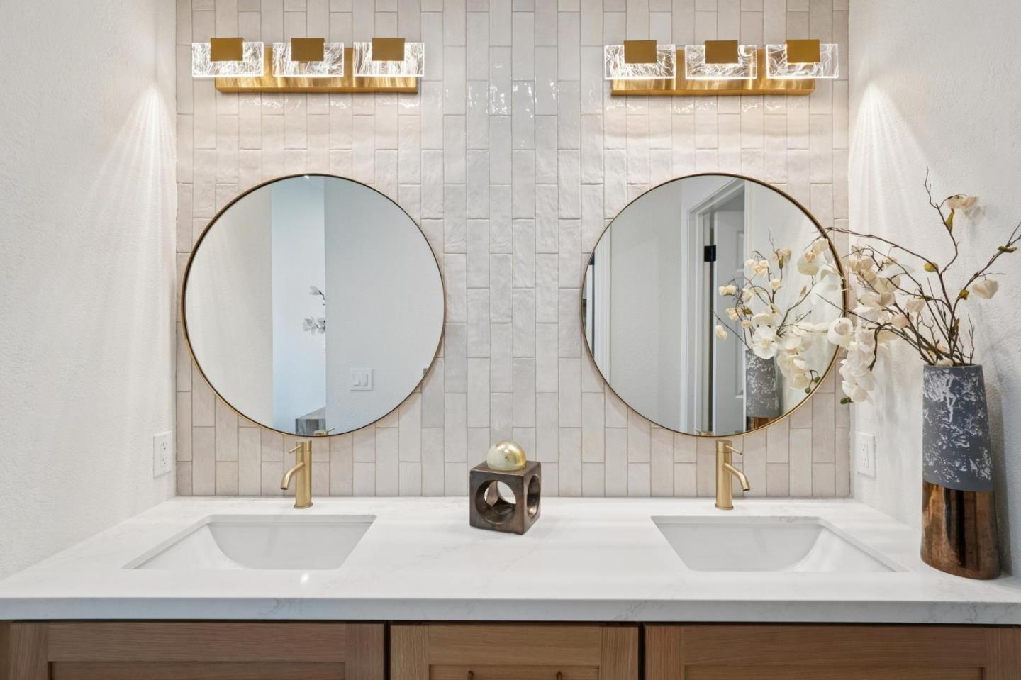 135 Troon Way Half Moon Bay, CA 94019 - Photo 23 of 44 a bathroom with a sink and a mirror