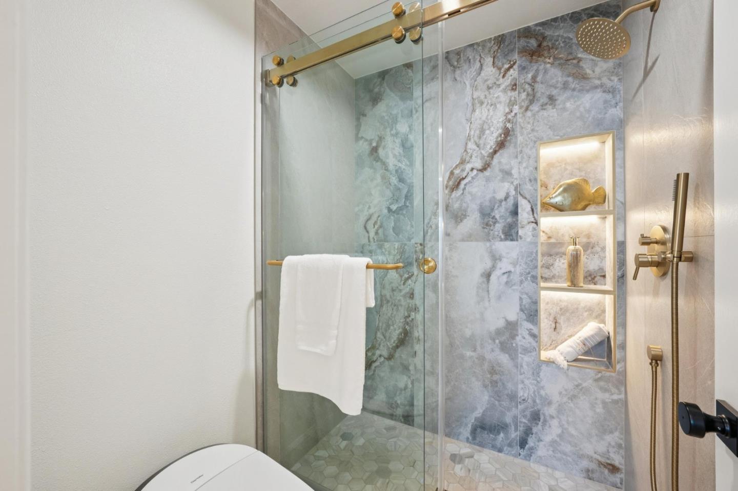 135 Troon Way Half Moon Bay, CA 94019 - Photo 25 of 44 a bathroom with a shower and toilet