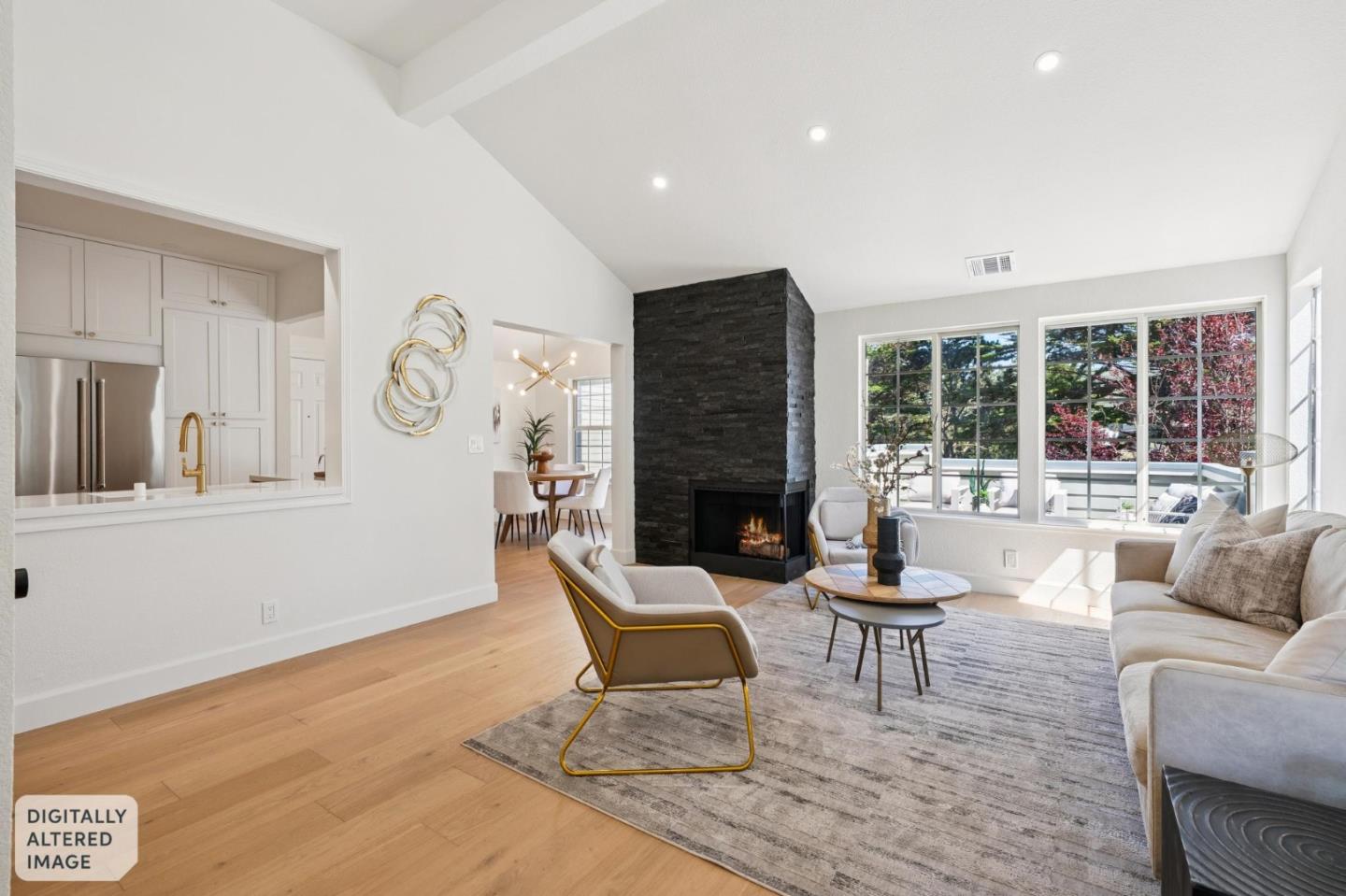 135 Troon Way Half Moon Bay, CA 94019 - Photo 3 of 44 a living room with furniture and a fireplace