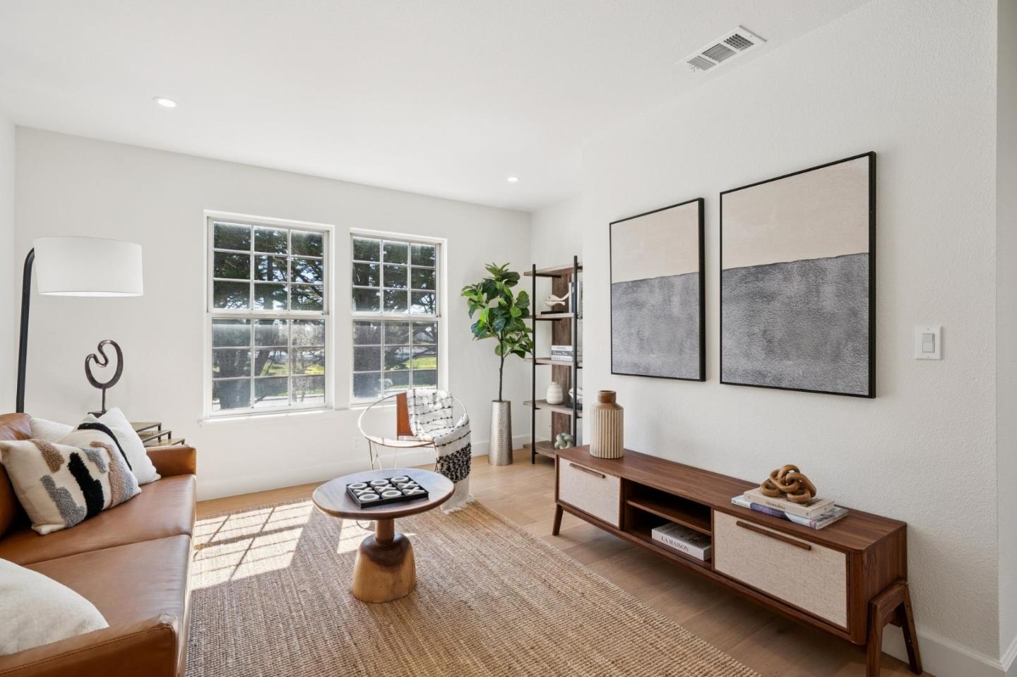 135 Troon Way Half Moon Bay, CA 94019 - Photo 36 of 44 a living room with furniture and a large window