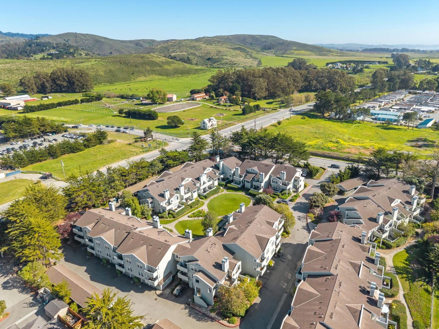 135 Troon Way Half Moon Bay, CA 94019 - Photo 41 of 44 a view of a city with an ocean