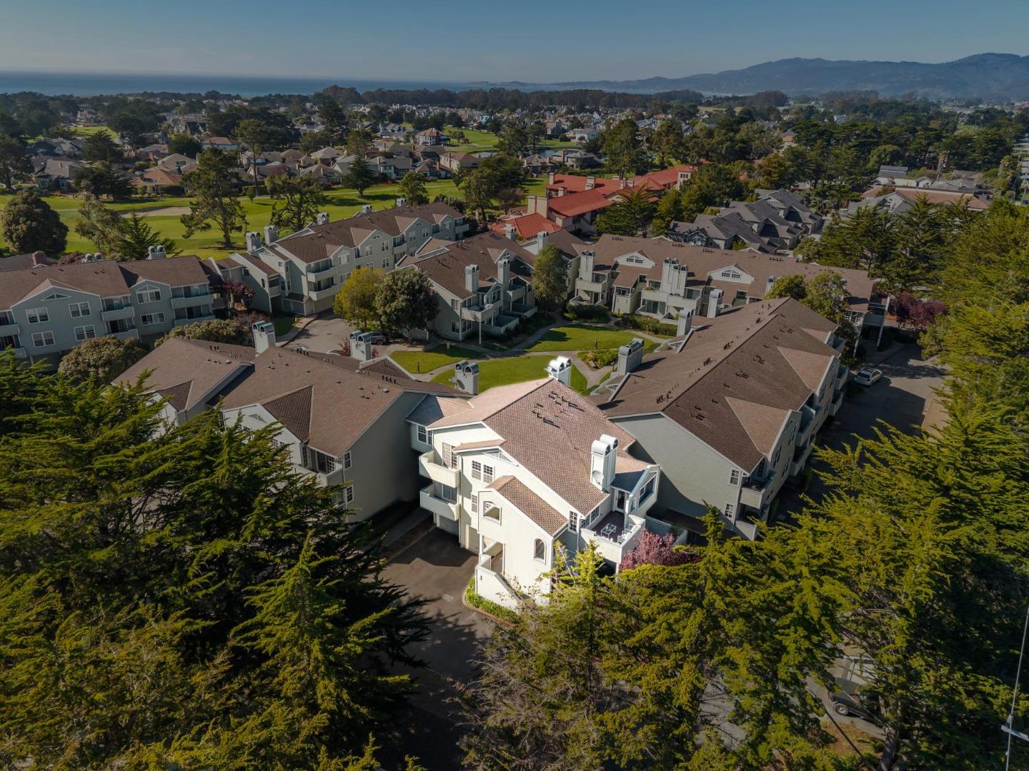 135 Troon Way Half Moon Bay, CA 94019 - Photo 43 of 44 an aerial view of a house with a garden