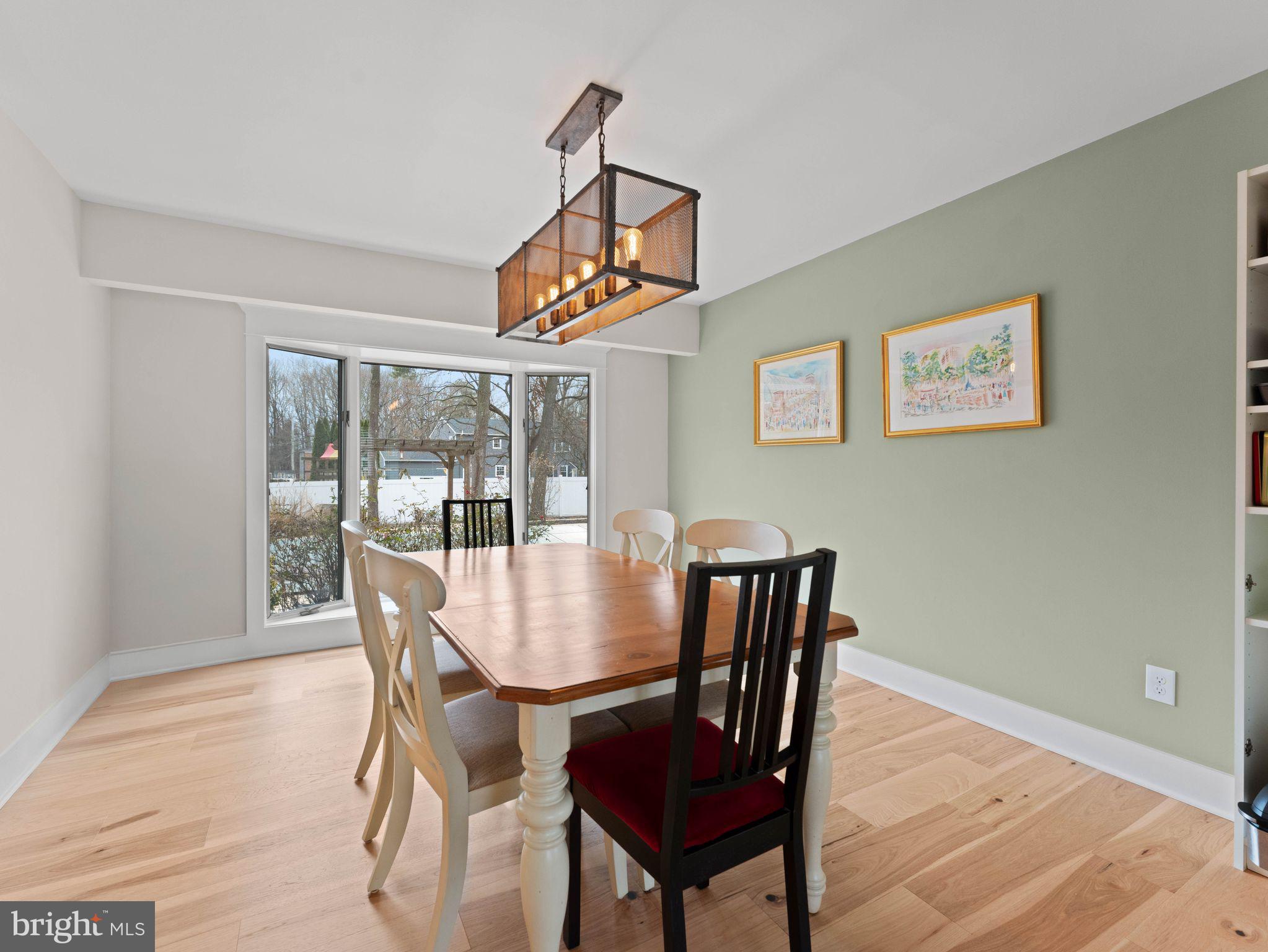 236 Carraige Hill Road Moorestown, NJ 08057 - Photo 15 of 57 a view of a dining room with furniture window and wooden floor