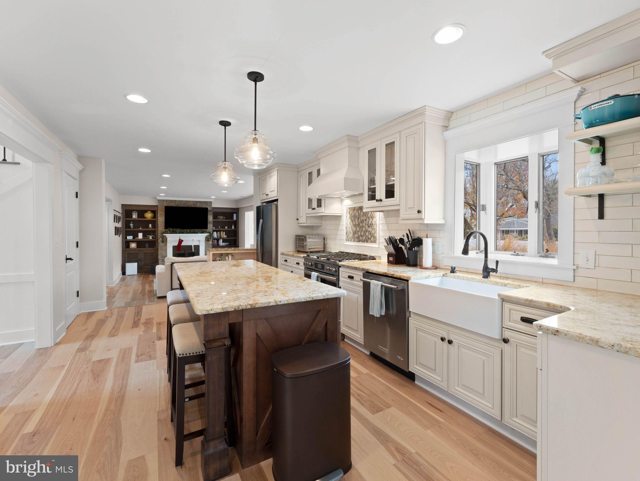 236 Carraige Hill Road Moorestown, NJ 08057 - Photo 17 of 57 a large kitchen with kitchen island a sink table and chairs