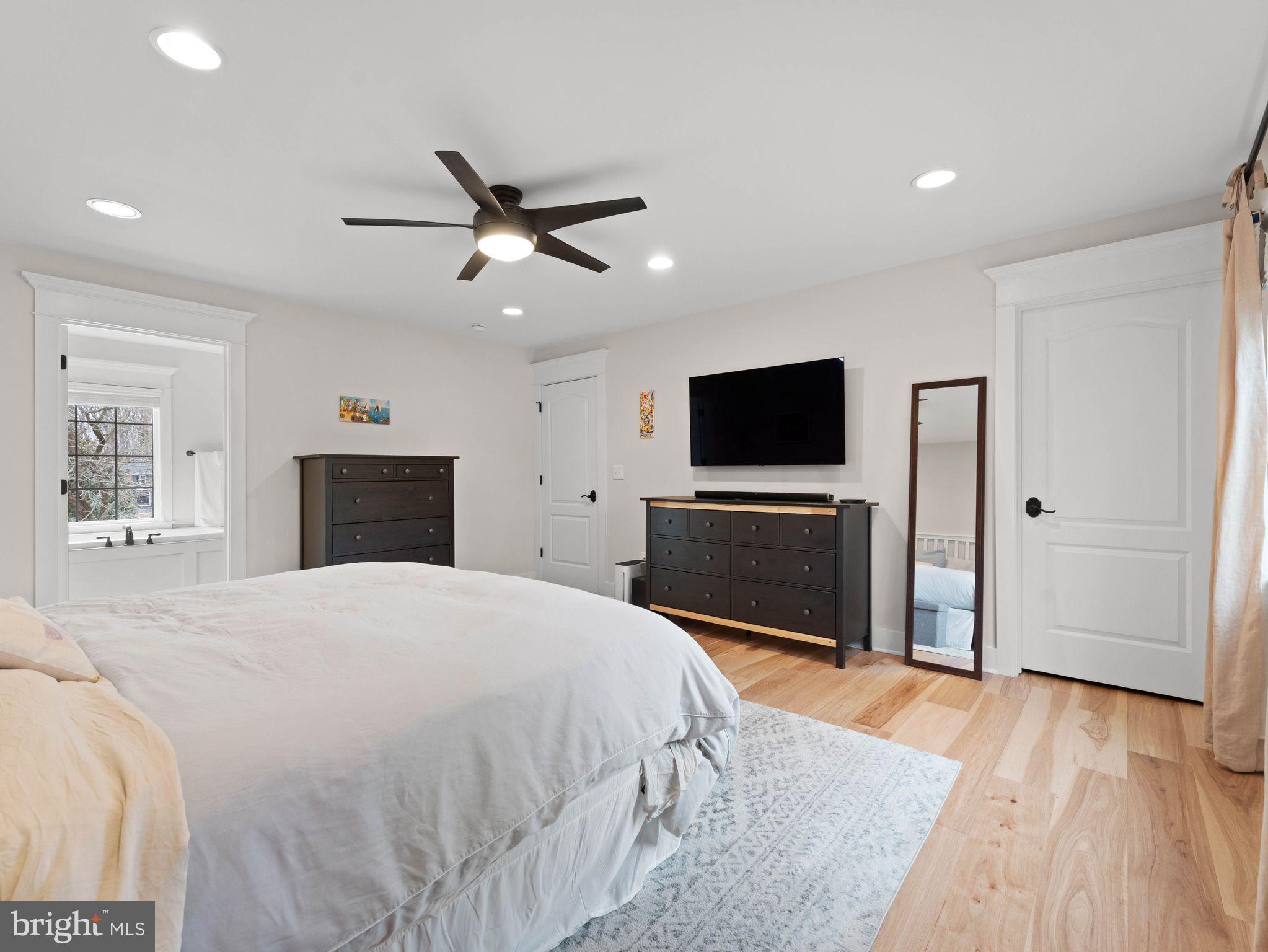 236 Carraige Hill Road Moorestown, NJ 08057 - Photo 27 of 57 a bedroom with a bed and a flat screen tv