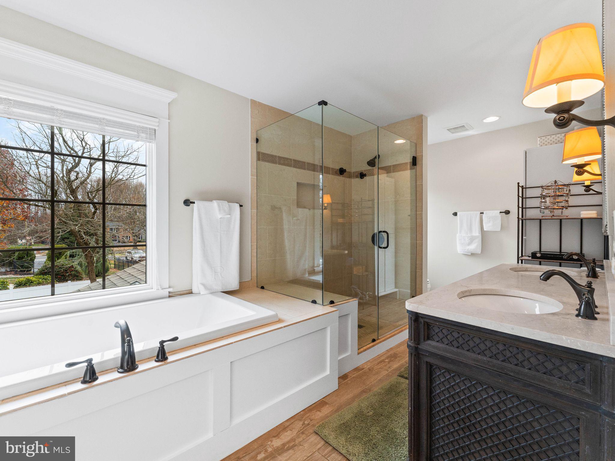 236 Carraige Hill Road Moorestown, NJ 08057 - Photo 30 of 57 a spacious bathroom with a tub sink and mirror