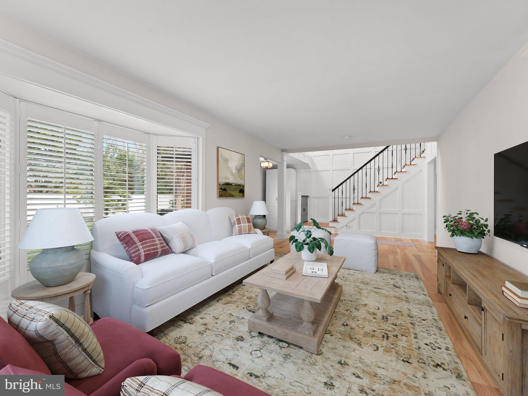 236 Carraige Hill Road Moorestown, NJ 08057 - Photo 6 of 57 a living room with furniture and a large window
