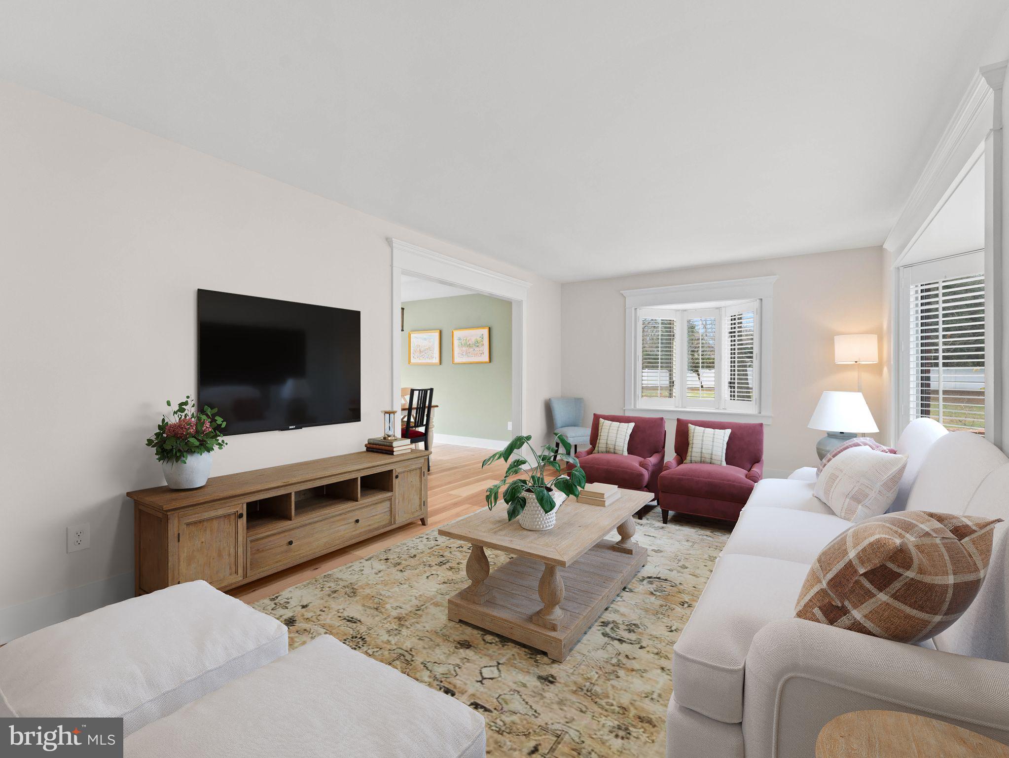 236 Carraige Hill Road Moorestown, NJ 08057 - Photo 7 of 57 a living room with furniture and a flat screen tv