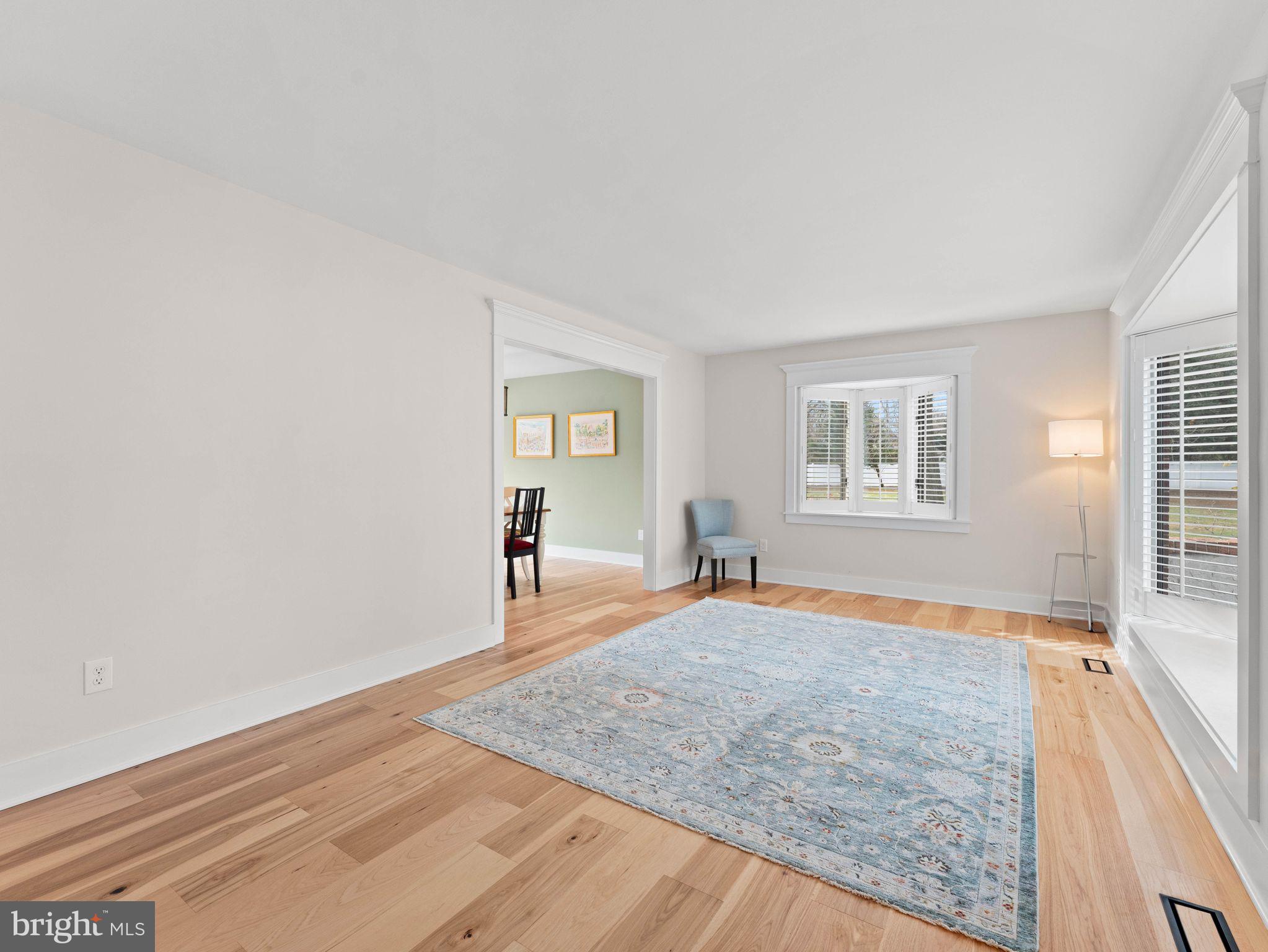 236 Carraige Hill Road Moorestown, NJ 08057 - Photo 9 of 57 a view of empty room with wooden floor and fan