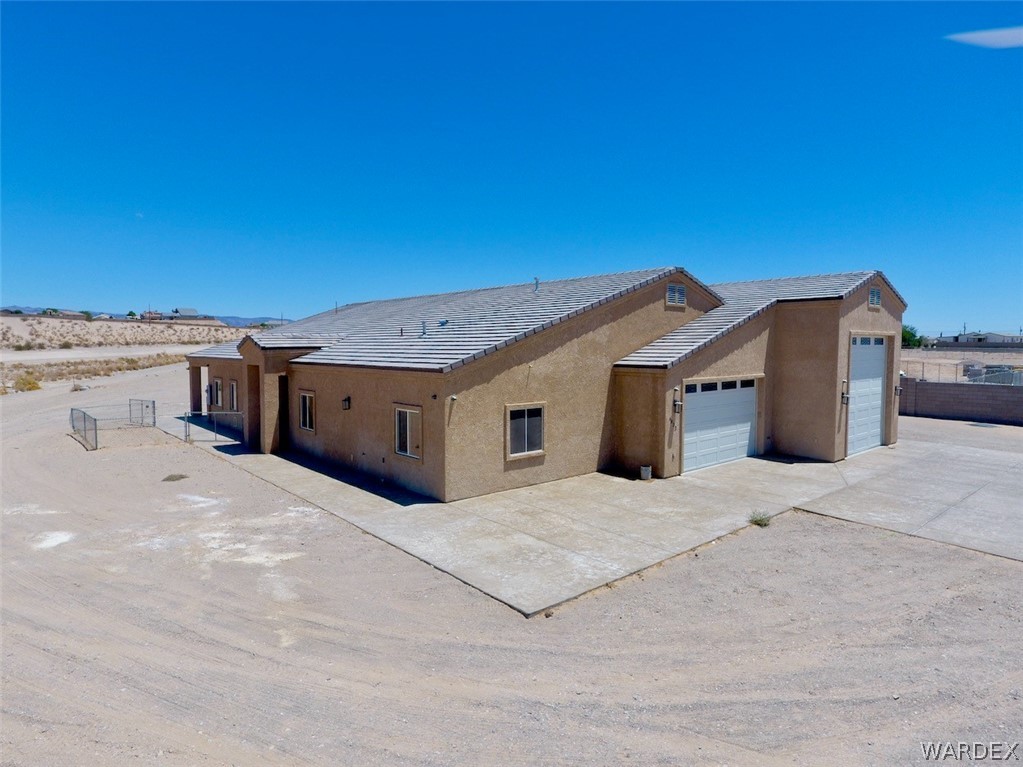 4822 La Riqueza Road Fort Mohave, AZ 86426 - Photo 3 of 35 a view of a house with a terrace