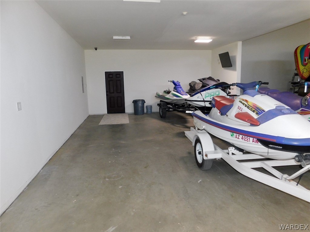 4822 La Riqueza Road Fort Mohave, AZ 86426 - Photo 33 of 35 a room with gym equipment and a table