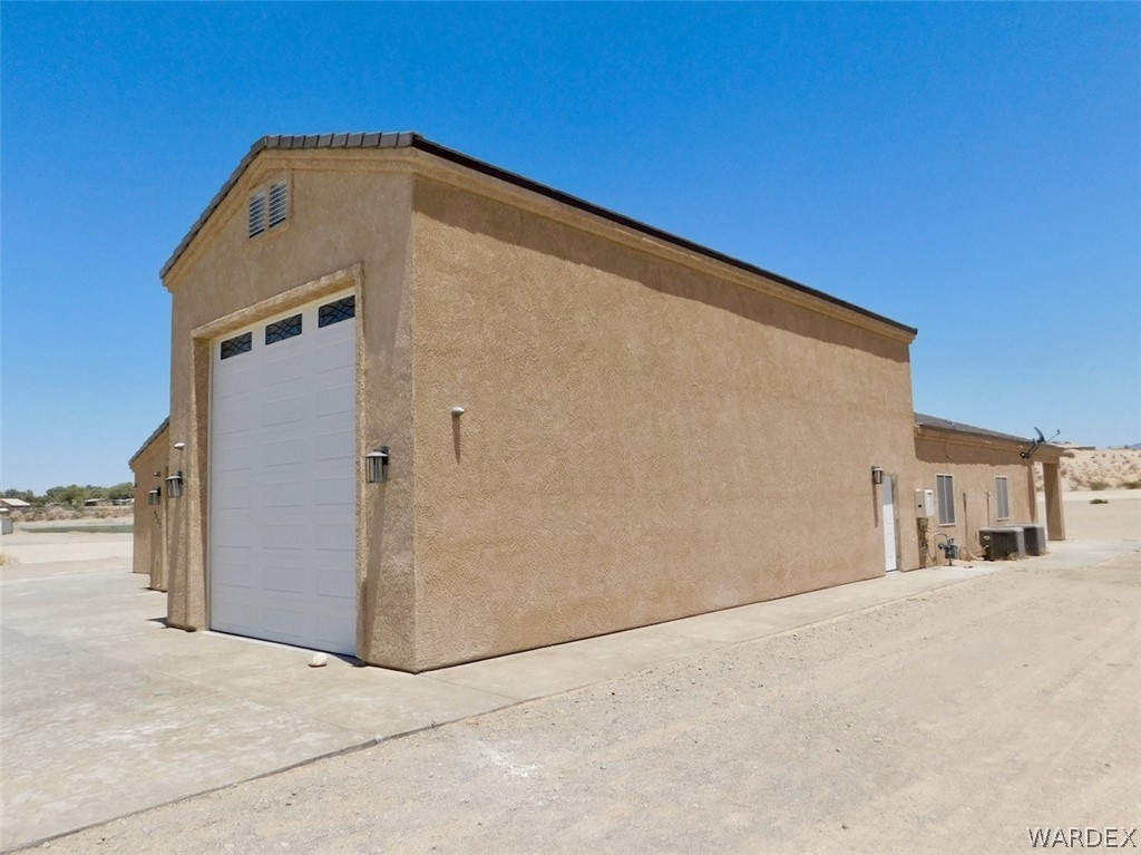 4822 La Riqueza Road Fort Mohave, AZ 86426 - Photo 8 of 35 a front view of a house with a yard