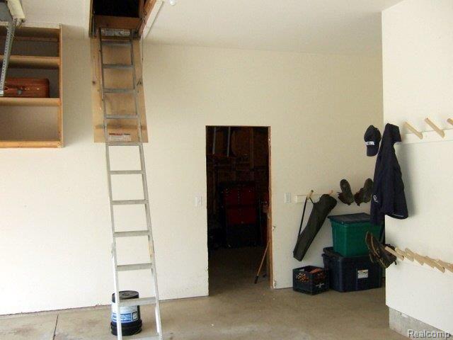 5758 Mason Road Fowlerville, MI 48836 - Photo 21 of 25 Full stairs to floored attic