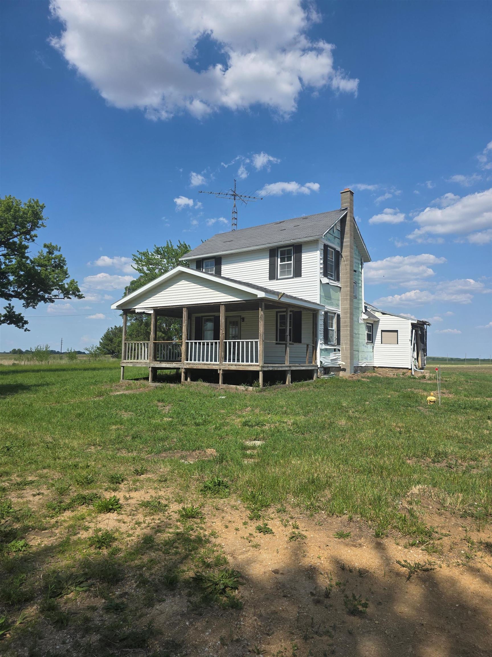 903 Sterling Road Dixon, IL 61021 - Photo 1 of 24 a front view of a house with a garden