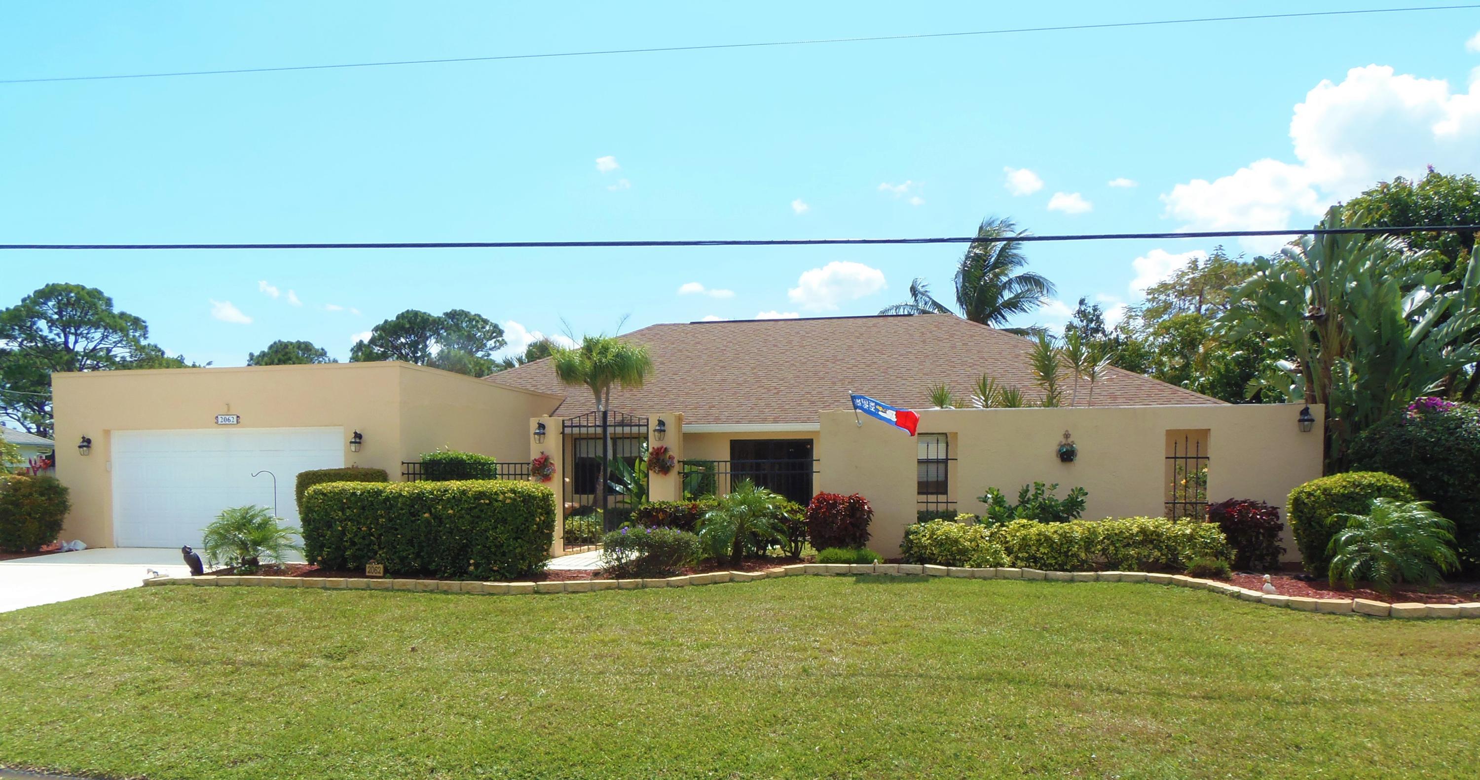 2062 Southeast Elmhurst Road Port St. Lucie, FL 34952 - Photo 1 of 46 Front Main