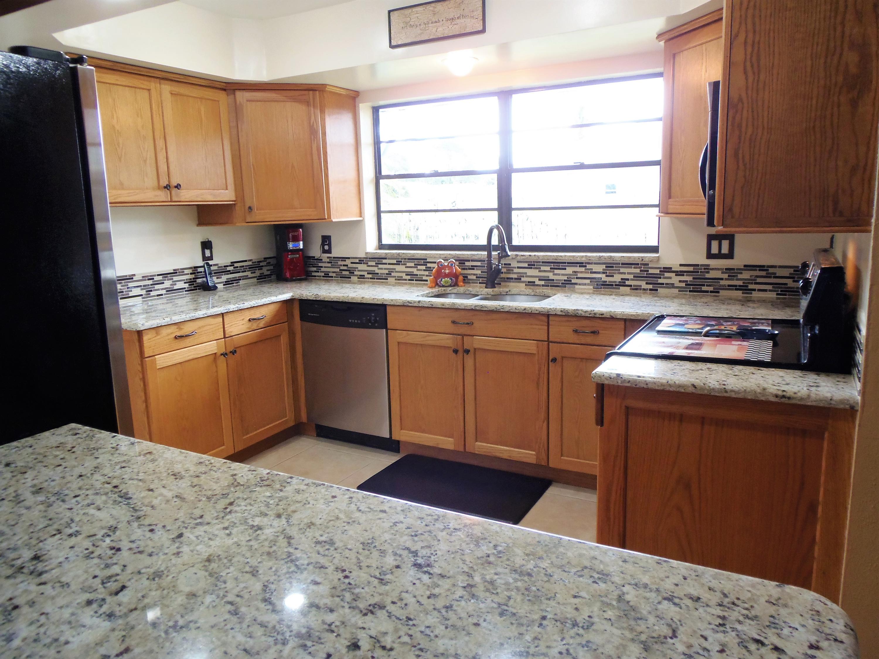 2062 Southeast Elmhurst Road Port St. Lucie, FL 34952 - Photo 19 of 46 Kitchen