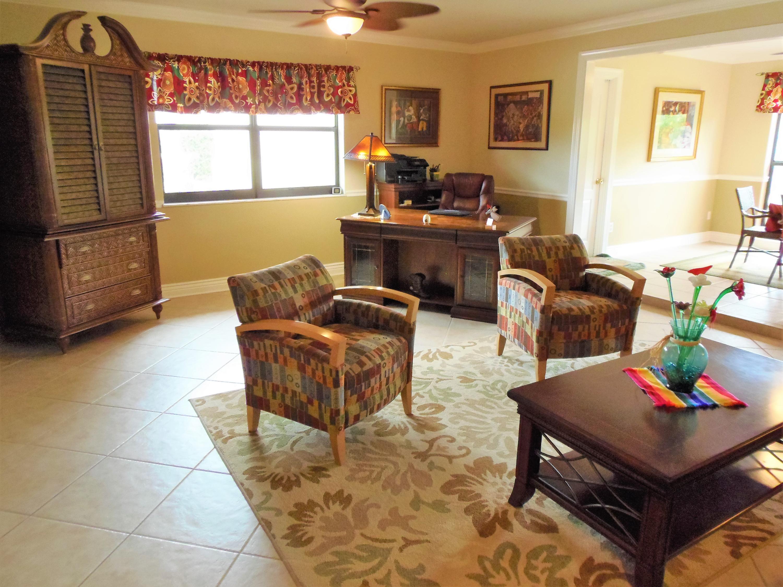 2062 Southeast Elmhurst Road Port St. Lucie, FL 34952 - Photo 20 of 46 Living Room 1