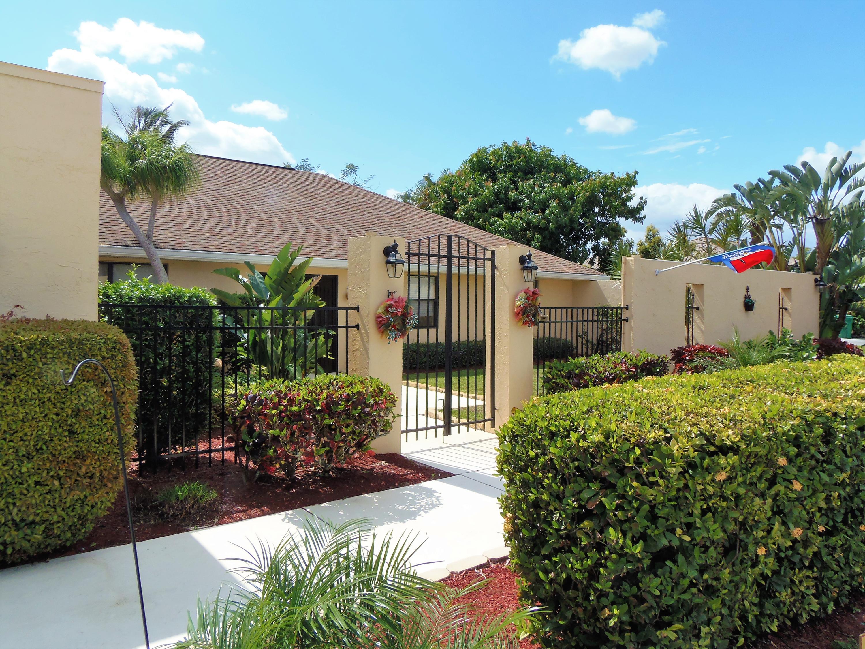 2062 Southeast Elmhurst Road Port St. Lucie, FL 34952 - Photo 3 of 46 front walkway 2