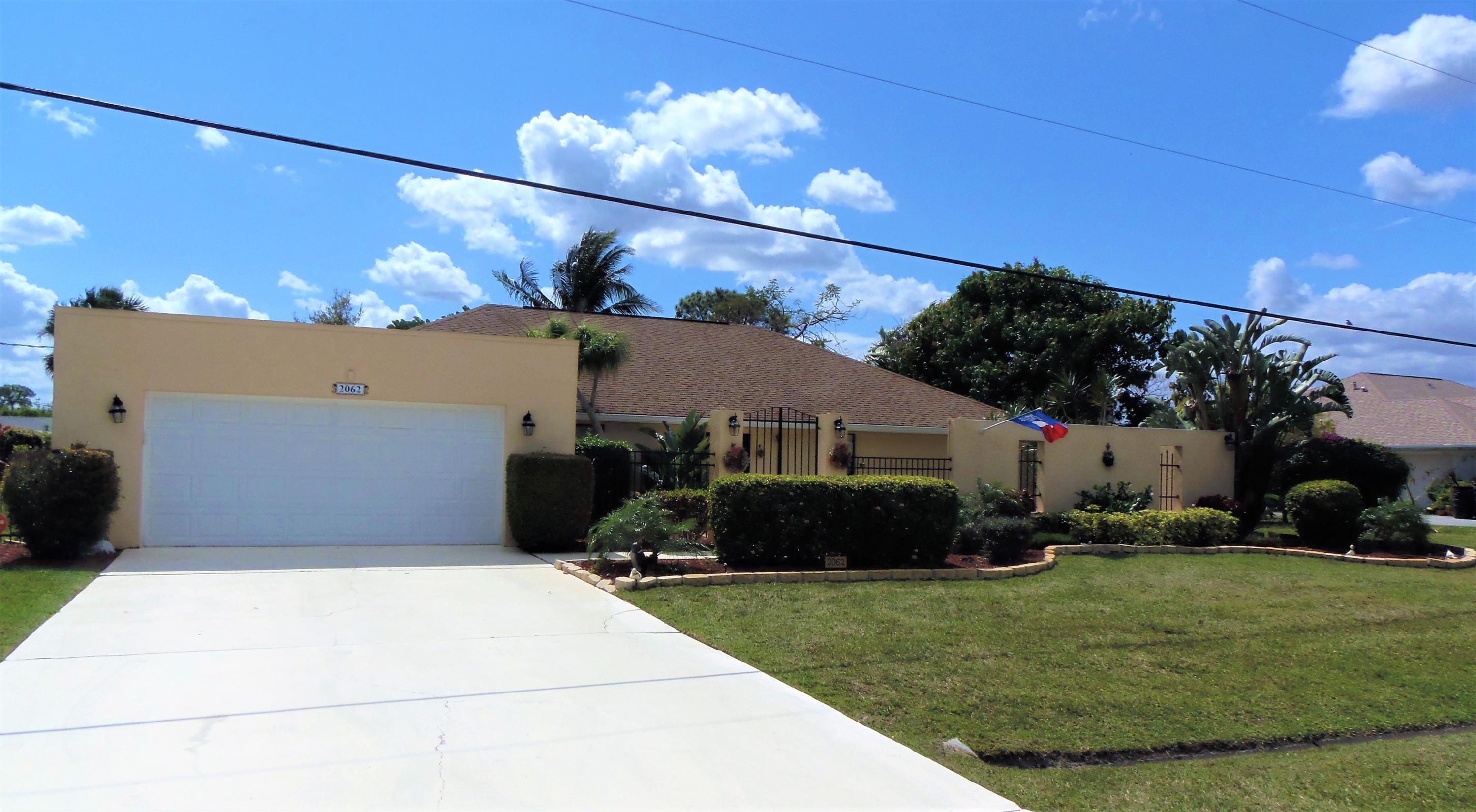 2062 Southeast Elmhurst Road Port St. Lucie, FL 34952 - Photo 4 of 46 Front 6
