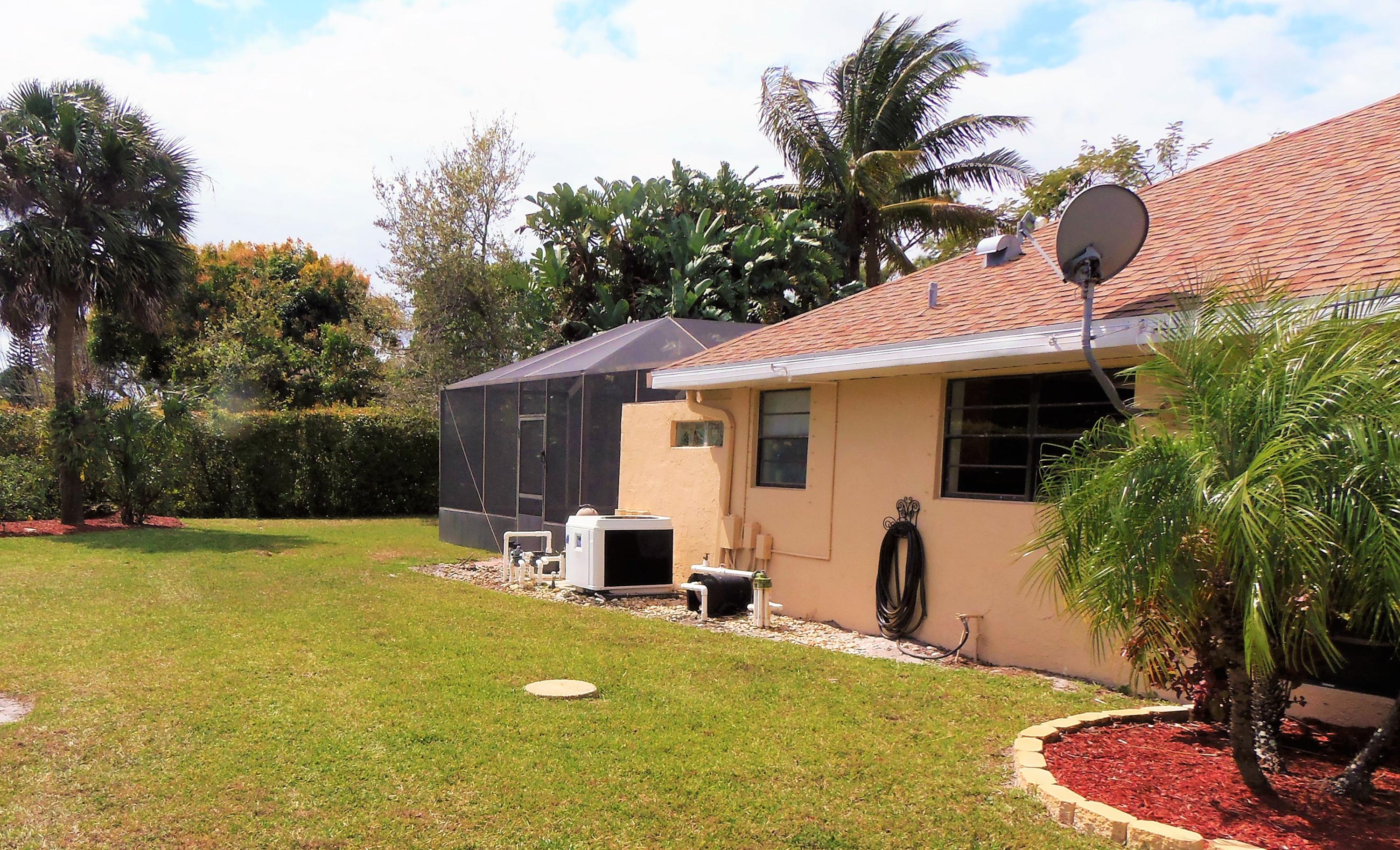 2062 Southeast Elmhurst Road Port St. Lucie, FL 34952 - Photo 46 of 46 Side Yard