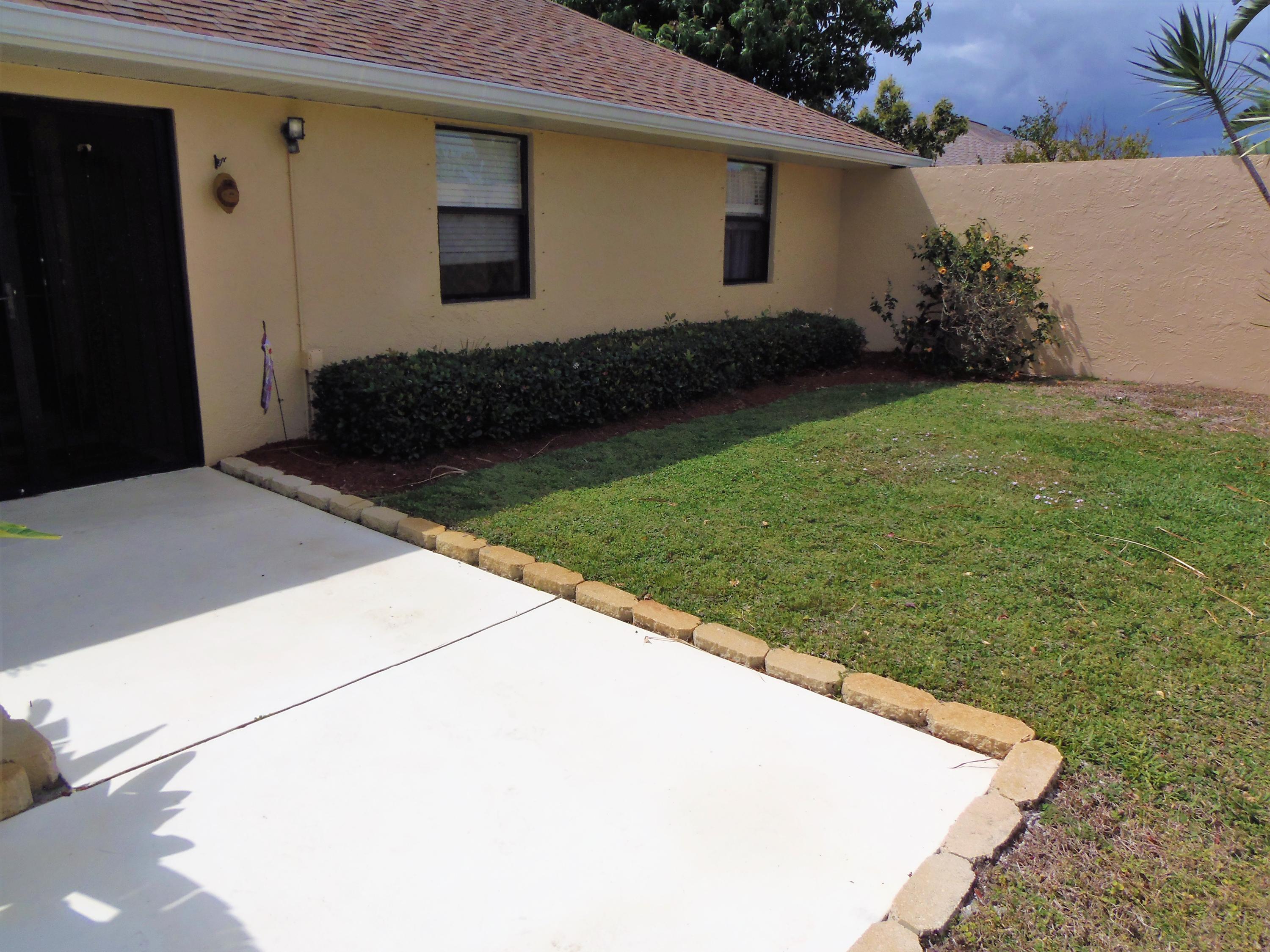 2062 Southeast Elmhurst Road Port St. Lucie, FL 34952 - Photo 5 of 46 Court Yard