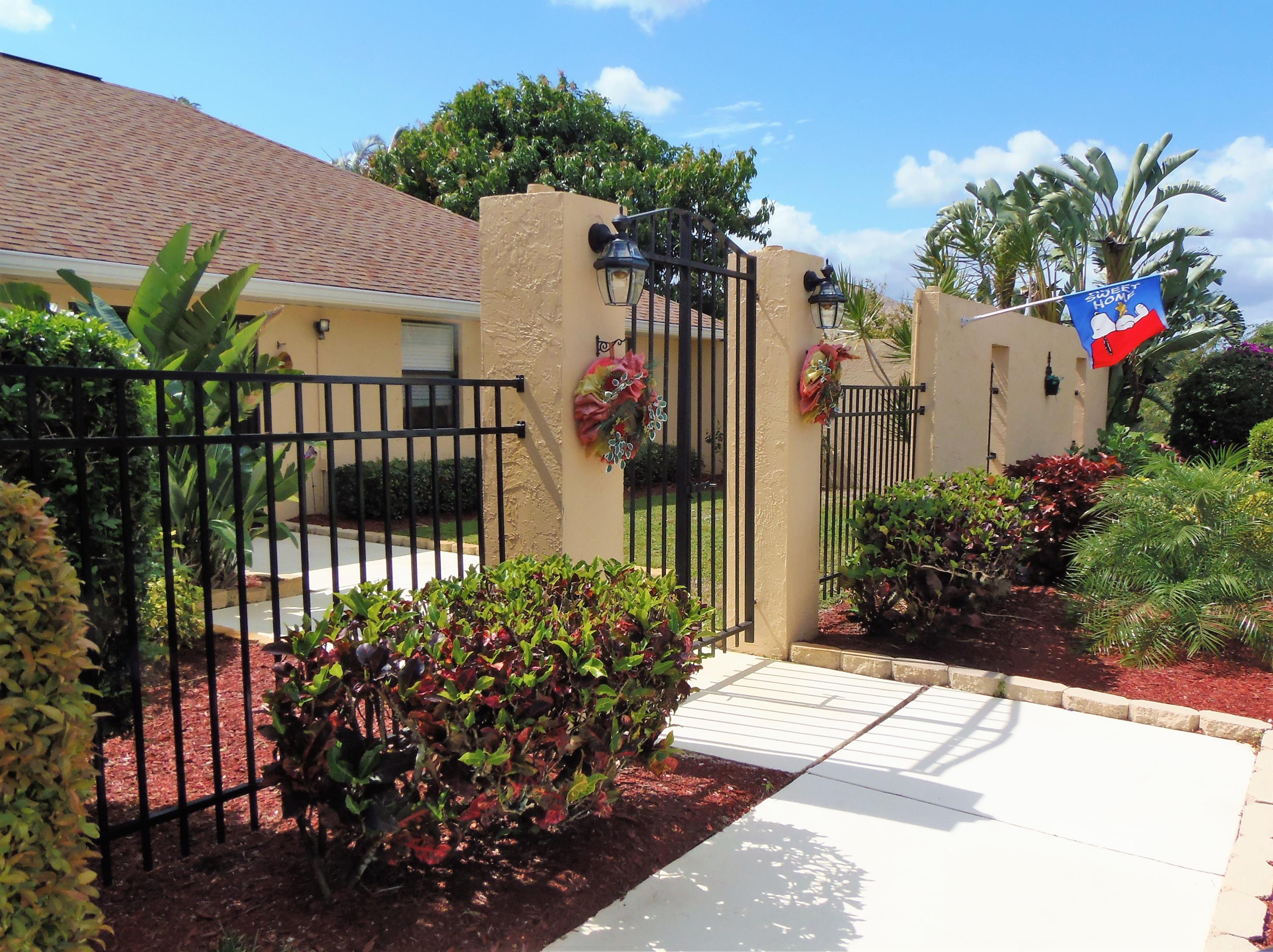 2062 Southeast Elmhurst Road Port St. Lucie, FL 34952 - Photo 7 of 46 Front Entrance