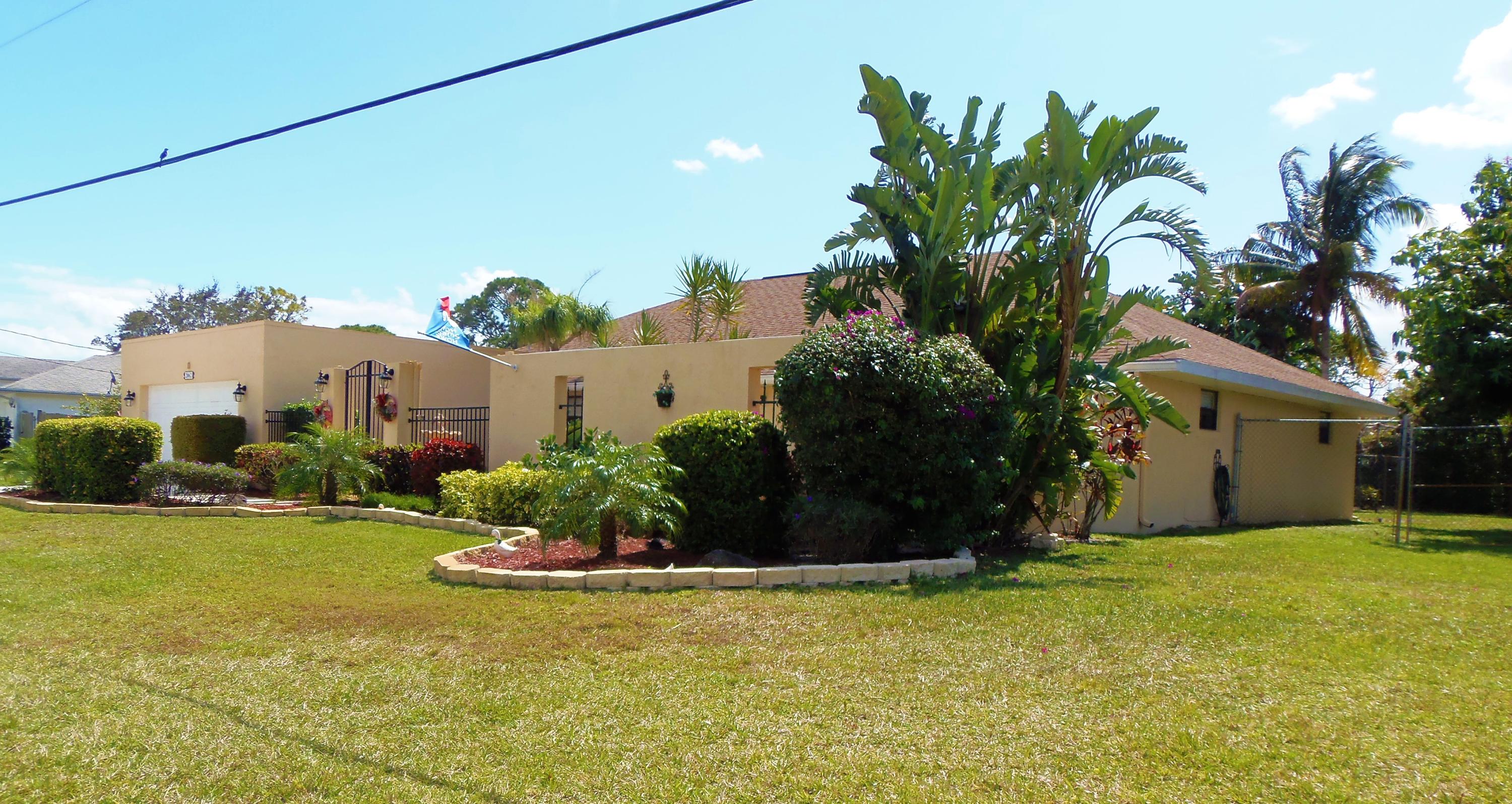 2062 Southeast Elmhurst Road Port St. Lucie, FL 34952 - Photo 8 of 46 Front