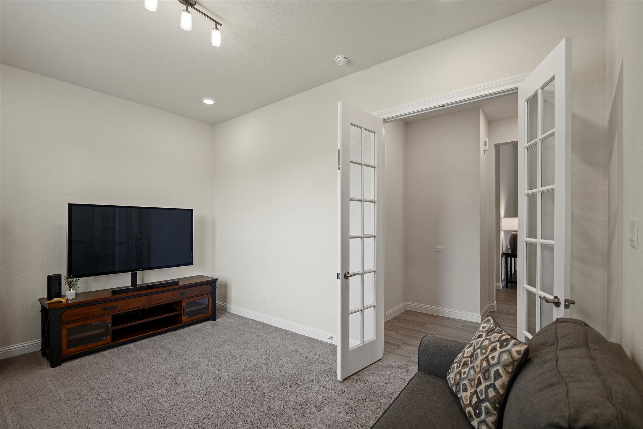 20330 Rosegold Way Spring, TX 77379 - Photo 32 of 48 Flexible bonus room features large windows that fill the space with natural light.