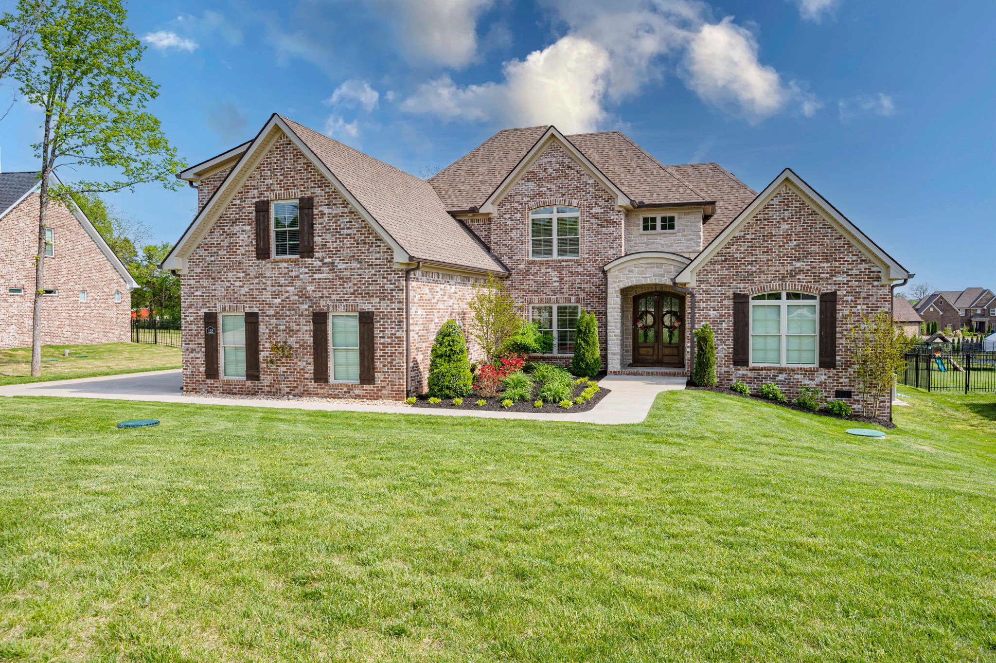 128 Seclusion Court Murfreesboro, TN 37129 - Photo 1 of 68 a front view of a house with a yard and porch