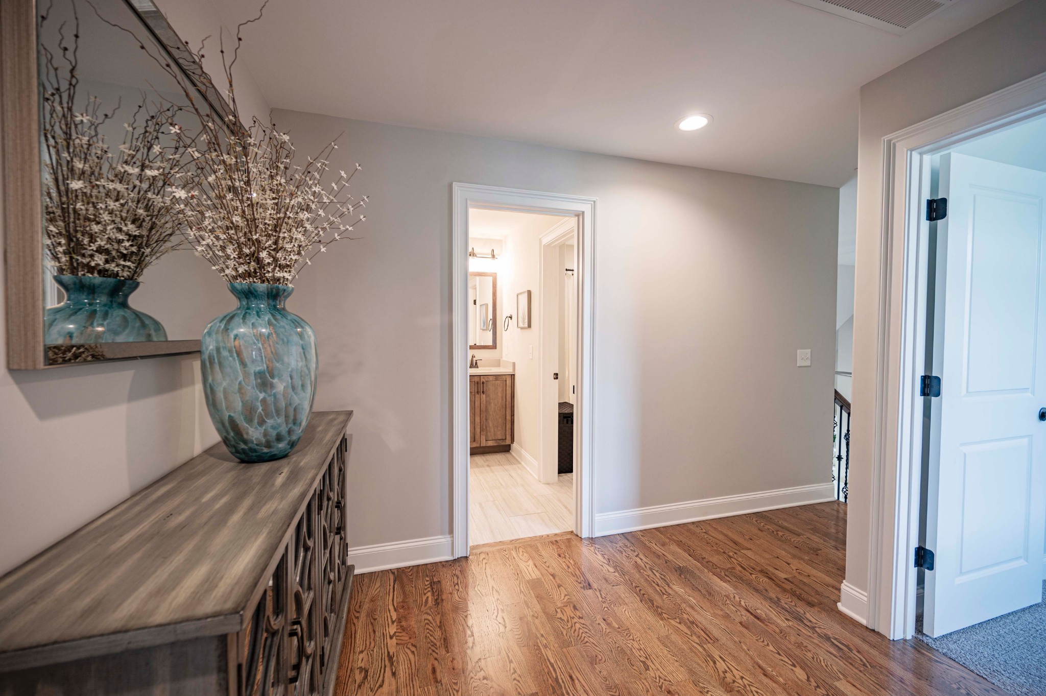 128 Seclusion Court Murfreesboro, TN 37129 - Photo 29 of 68 a view of a livingroom and a dining room with wooden floor