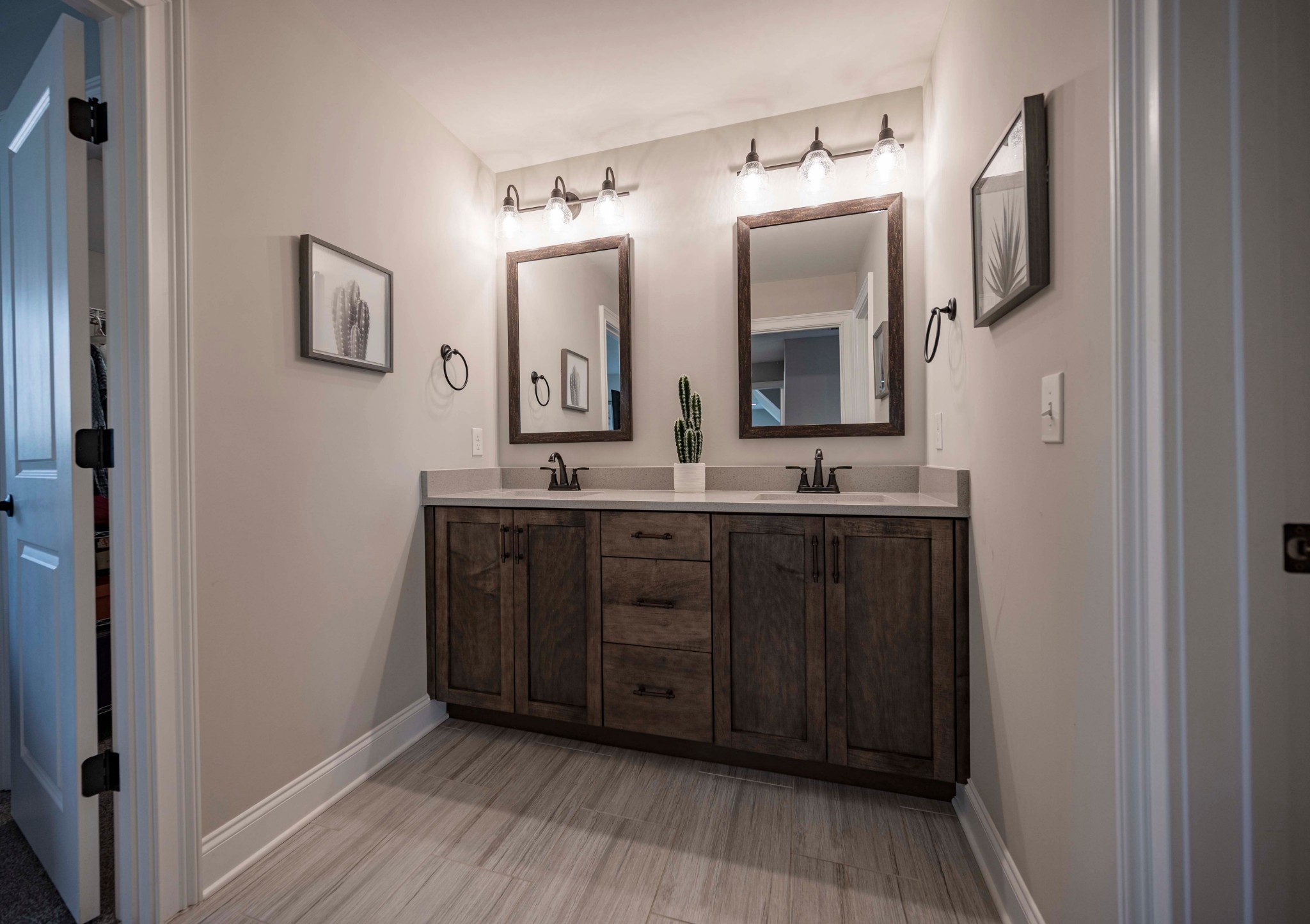 128 Seclusion Court Murfreesboro, TN 37129 - Photo 33 of 68 a bathroom with a double vanity sink and mirror